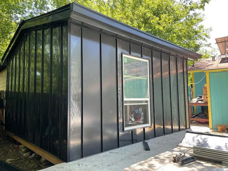 Black standing seam metal wall panels for Metal Roof Installation in Hawthorne